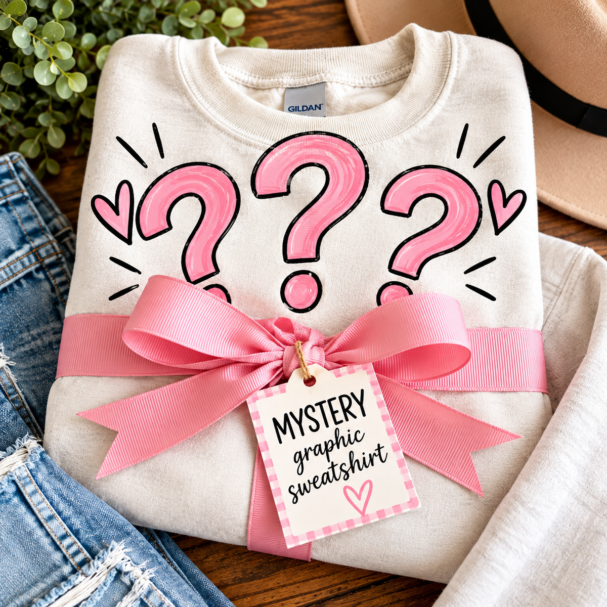 Mystery graphic sweatshirt promotional example; actual sweatshirt color and graphic are a surprise