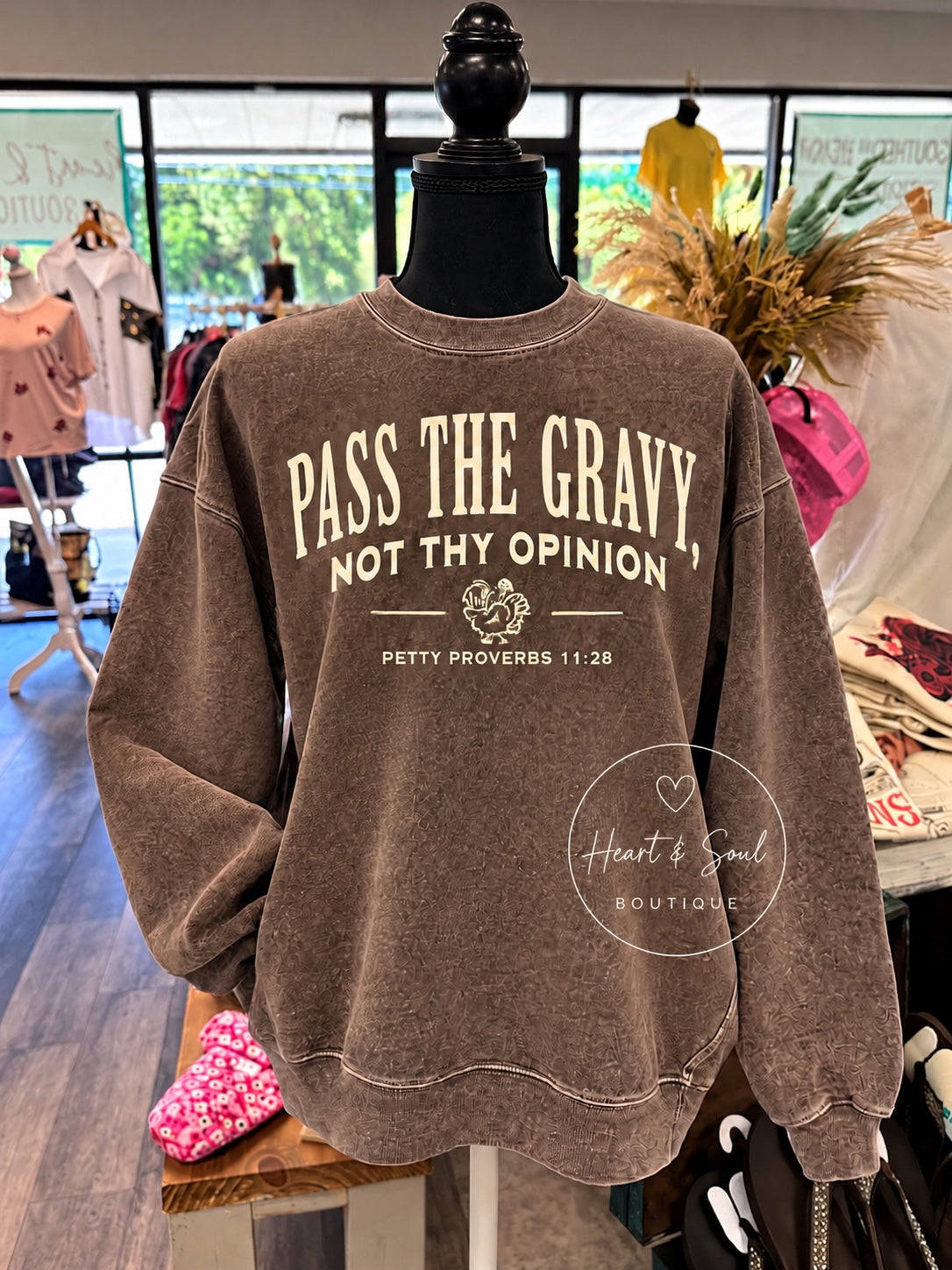 Vintage brown Pass the Gravy sweatshirt on mannequin