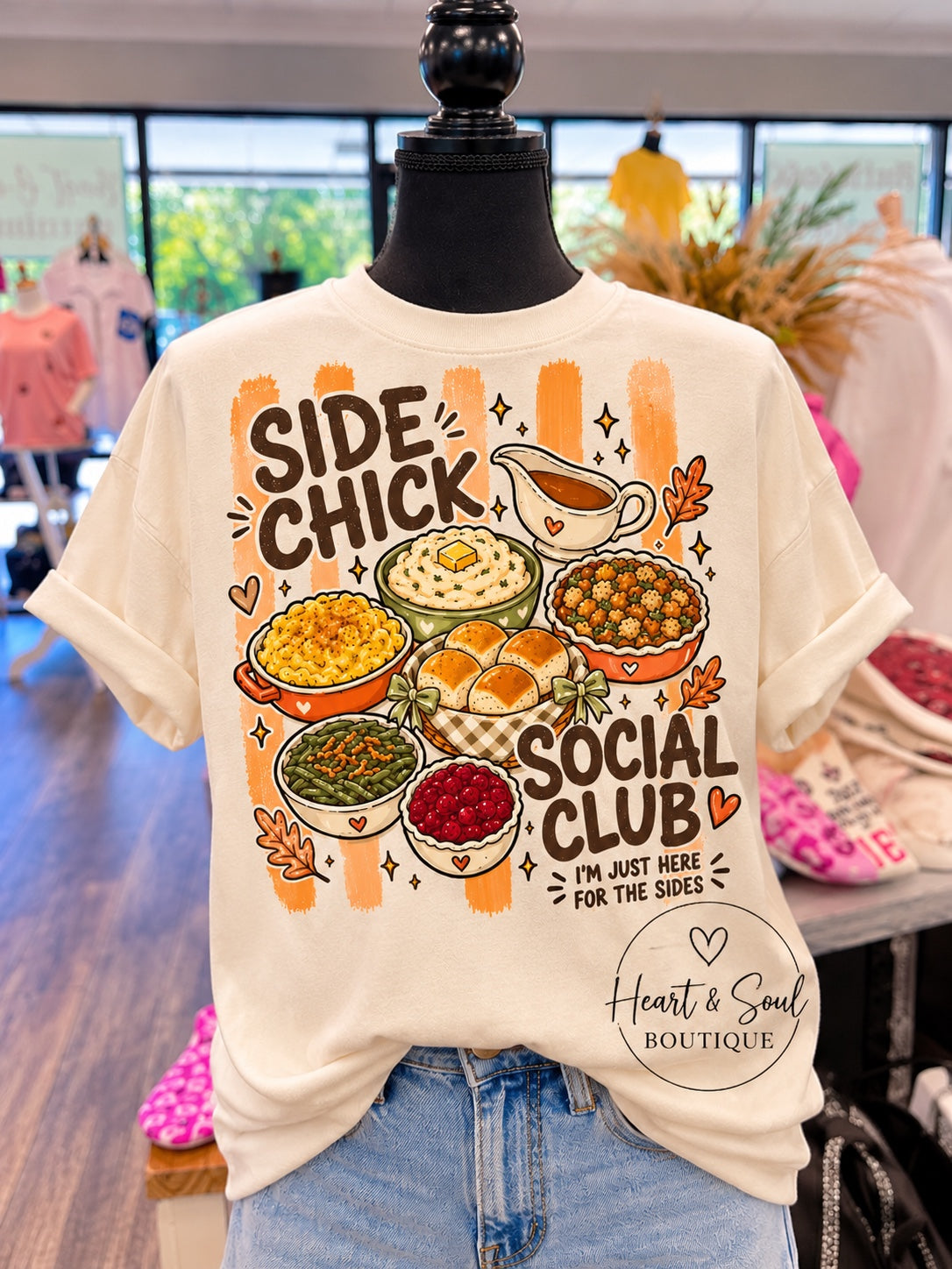 Cream Side Chick Social Club graphic tee on boutique mannequin